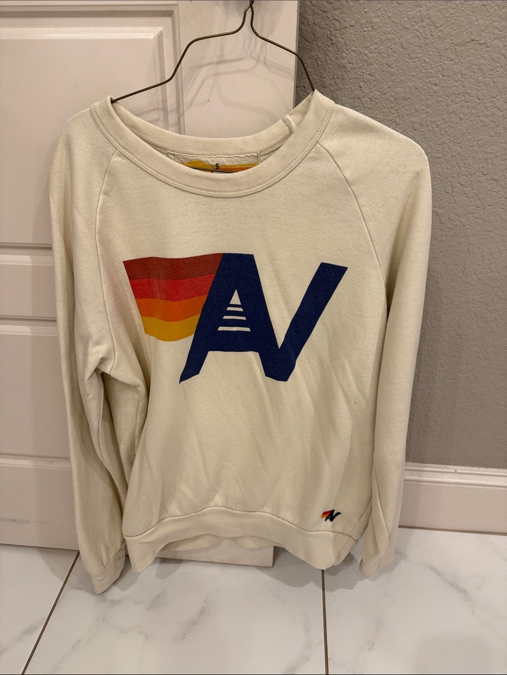 Aviator Nation Cream Crewneck with Navy & Sunset Stripe Logo